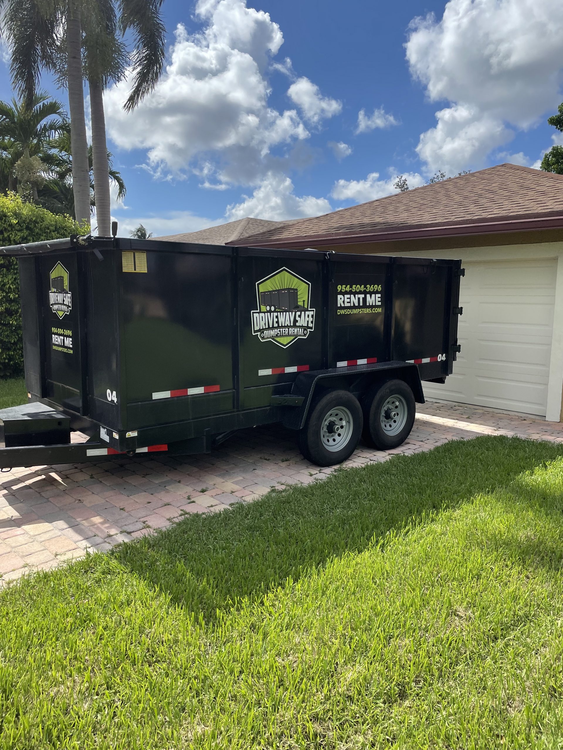 Driveway Safe Dumpster Rental organized worksite
